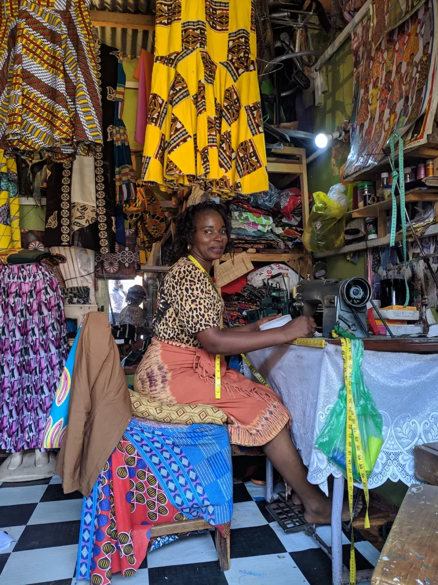 a tailor in her shop